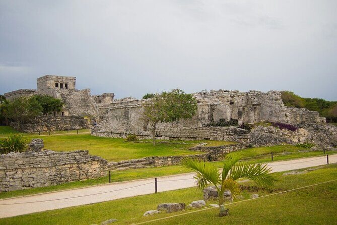 4x1 Explore TULUM Coba, Cenote and Mas, with transportation + Lunch. - Stop 1: Tulum Ruins With Sea Views and a Guided 45-Minute Walk