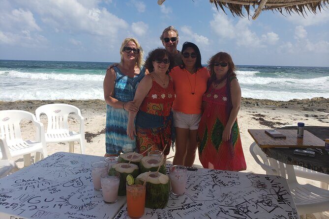 Amazing Cozumel Island Bar Tour - Playa Chen Rio: beach chairs, a mini tiki bar, and a possible crocodile sighting
