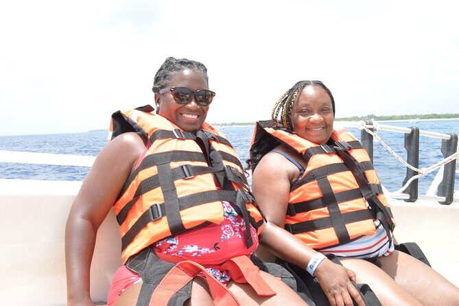 Best Parasailing Cozumel + Locker - On the boat: harnessing, instructions, and that first click