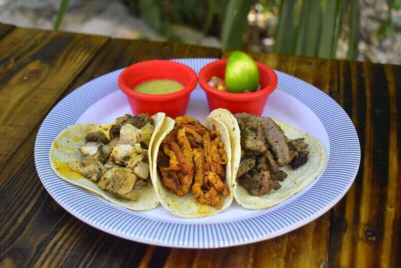 Cancún: Beachside Tacos & Town Tour with tequila tasing - Main Plaza Free Time for Shopping and Views