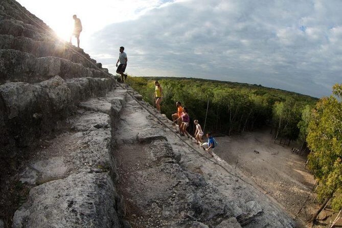 Coba Adventure: ATV, Rappel, Ziplines, Cenote, Archeological Zone Tour - ATV riding in the jungle—or a dirt-road version of it