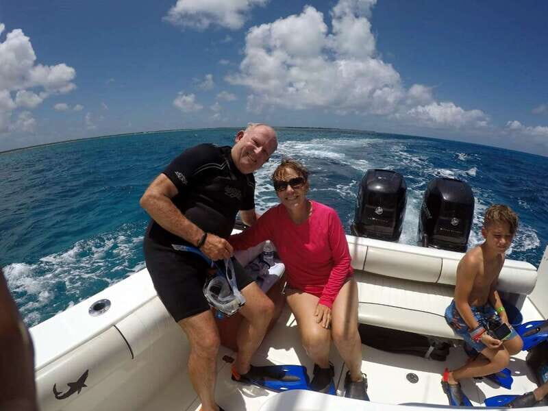 Cozumel: Private Charter Boat and Snorkel Day Trip - Cruising with complimentary drinks and a clean boat