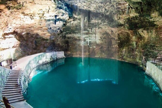 Deluxe adventure! 2 Sacred Cenotes, Chichen Itza and Valladolid from Tulum City - Cenote Ik kil: bright water, traditional buffet, and a real cool-off