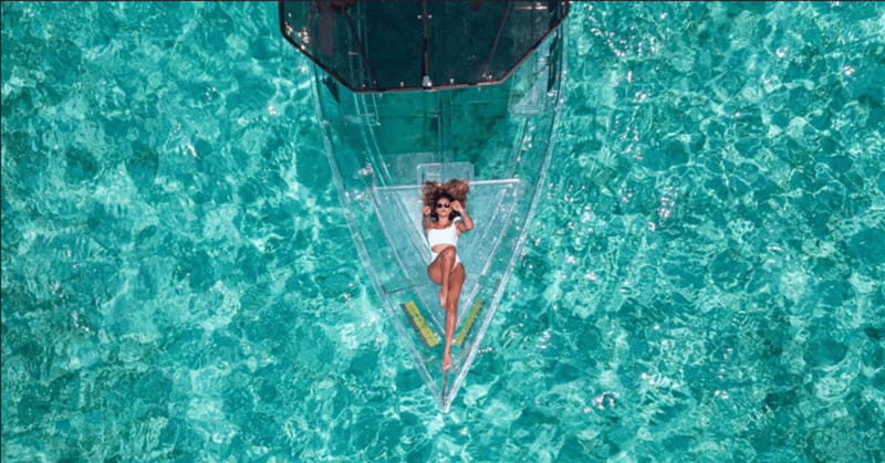 Explore the sea of cozumel in a transprent boat with drinks and snorkel. - Transparent Boat Views: Shipwrecks, Corals, and Tropical Fish