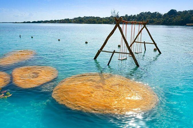 Full Day Bacalar with Boat Tour, Cenote Azul and Breakfast - Lake of the Seven Colors by boat: Bird Island, Pirate Canal, and swim breaks