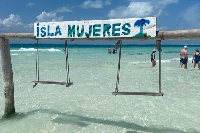 Isla Mujeres on luxury catamaran with snorkel, open bar and lunch - Stop 1 at El Meco: Finger Sculptures and Reef Snorkeling