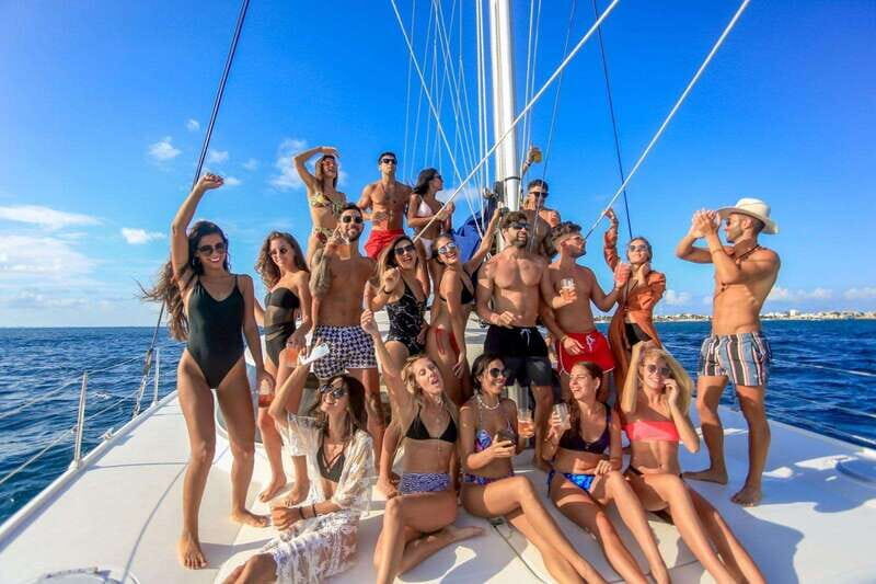 Isla Mujeres Plus Experience Catamaran Tour + Snorkel+Lunch - Lunch + Open Bar on the Catamaran: When Food and Drinks Actually Work