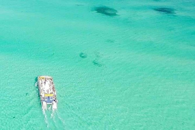 Isla Mujeres Unlimited Catamaran! Drinks, Fun & Party From Playa Del Carmen - The catamaran party vibe: drinks, music, and crew energy
