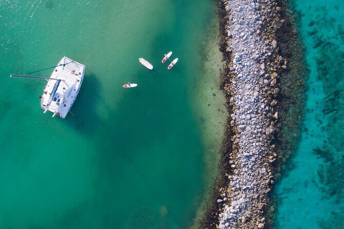 Luxury Sailing & Snorkeling Experience from Riviera Maya - SUP time: a second way to enjoy the Riviera Maya sea