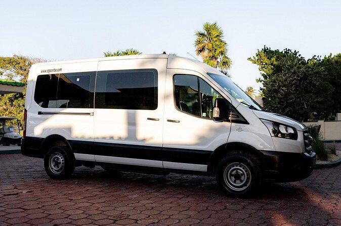 Tulum Airport Transportation to your destiny in Private Minibus - Green shirt vs black shirt: how to confirm you’re in the right place